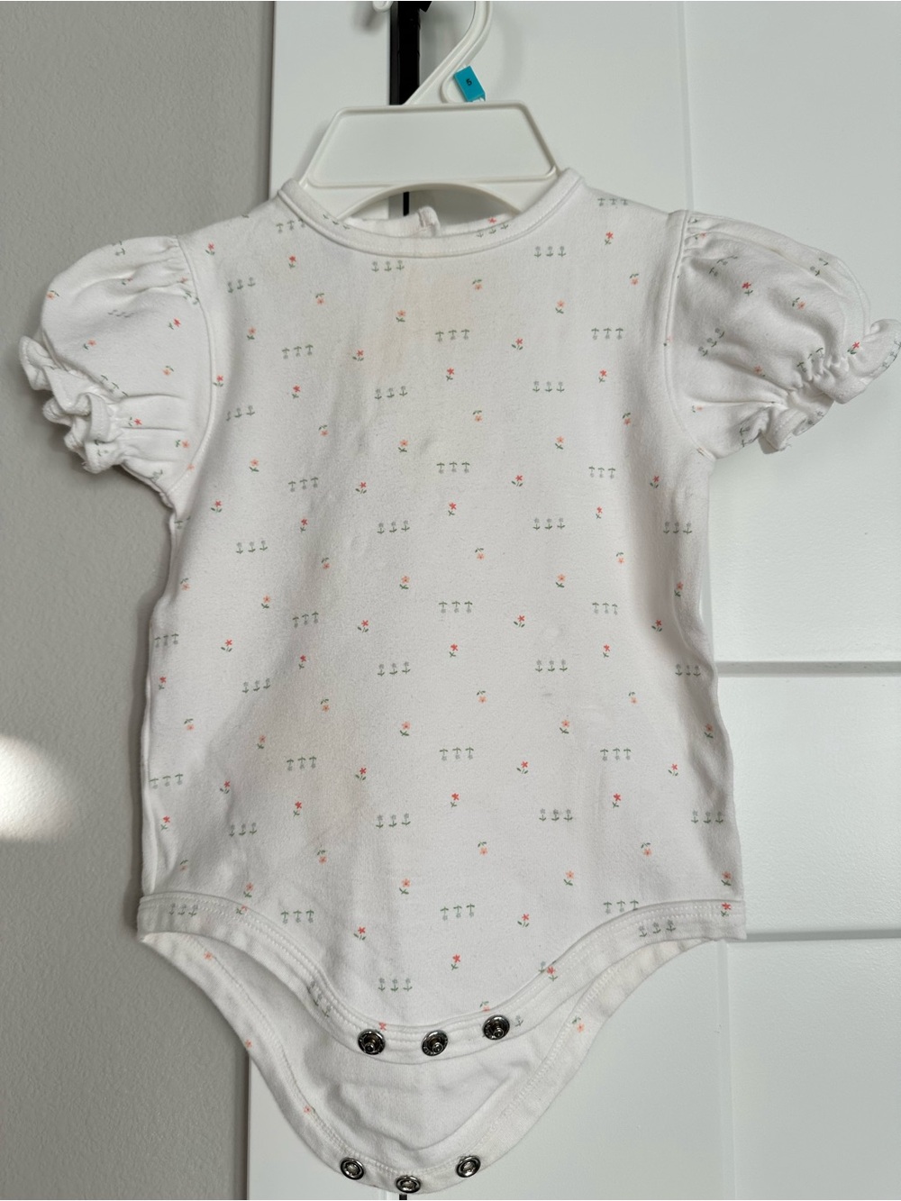 Cherokee baby play-wear. White Baby Onesie with Tiny Pink & Green Floral Print